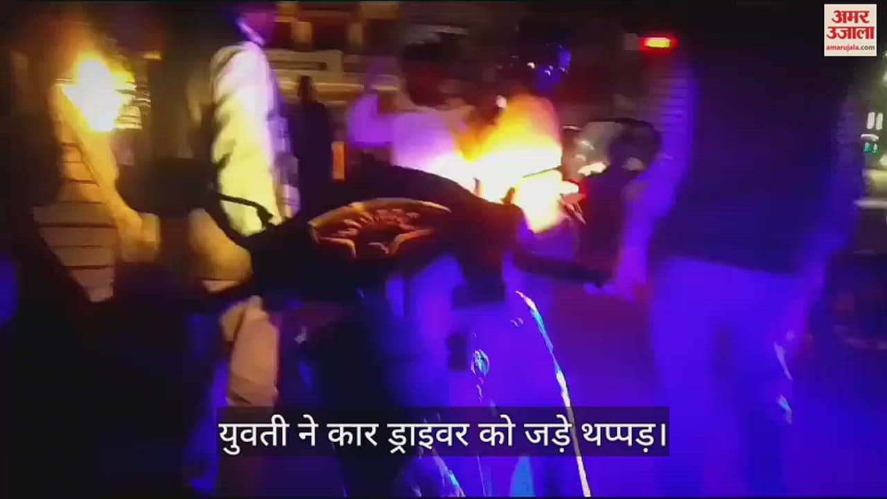 VIDEO : girl slapped car driver after collided with scooty in azamgarh