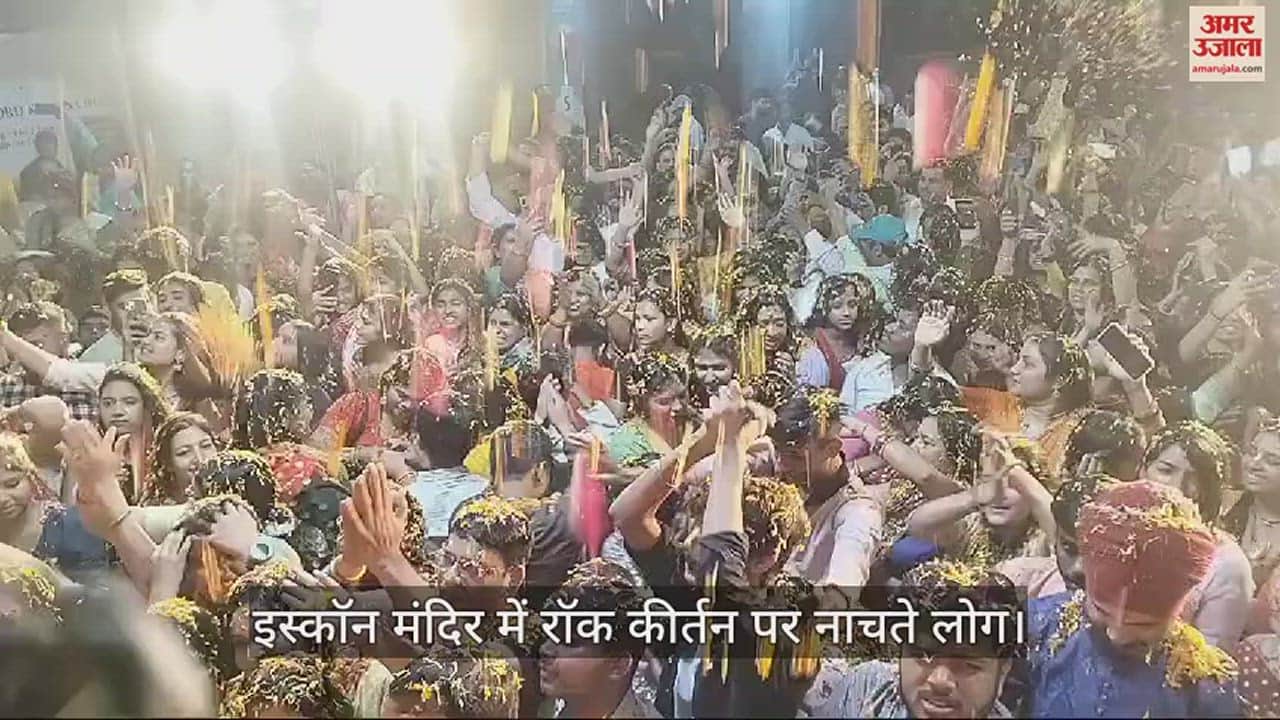 VIDEO : Devotees play Holi of flowers with Shri Radha Krishna in ISKCON temple varanasi