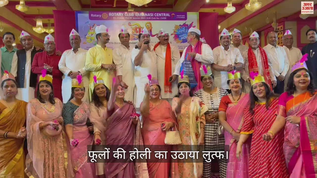 VIDEO : Rotary Club members play Holi of flowers in varanasi