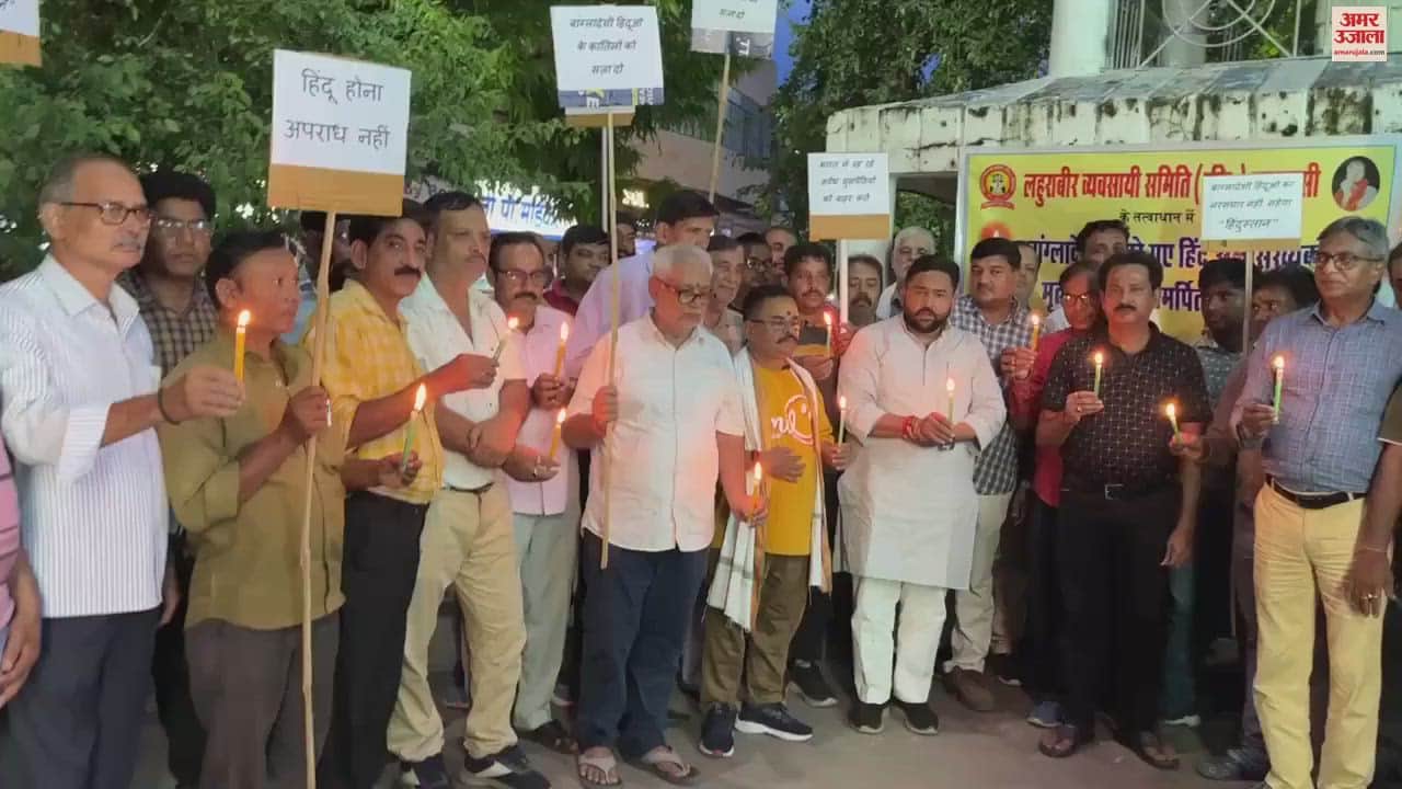 VIDEO : Traders took out candle march in Varanasi said- being a Hindu is not a crime