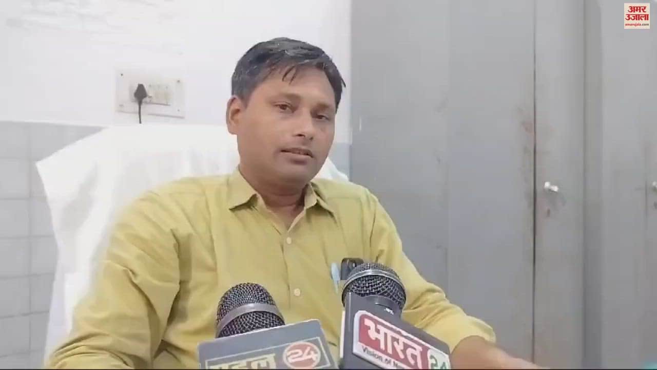 VIDEO : Bike overturned trying to save dog and auto two policemen injured one seriously