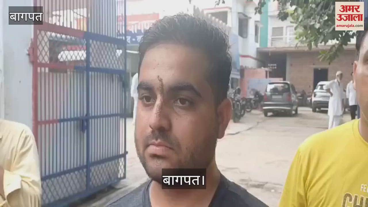 VIDEO : In Baghpat, a gas agency computer operator was robbed by putting a knife on his neck, people chased and beat the miscreant