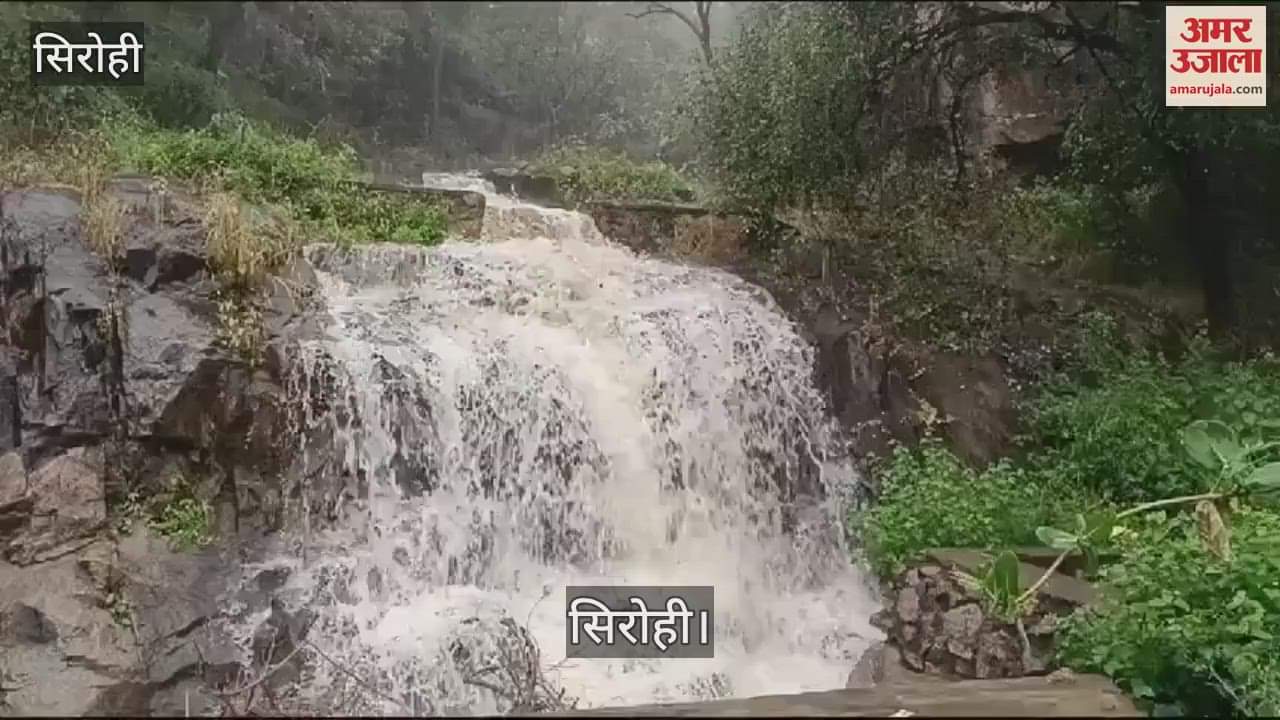 strong flow of rain water in the waterfall on Abu Road-Mount Abu road