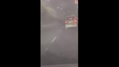 VIDEO : नोएडा में चलती कार से बाहर निकल स्टंट कर रहा था युवक, पुलिस ने काटा 13 हजार का चालान