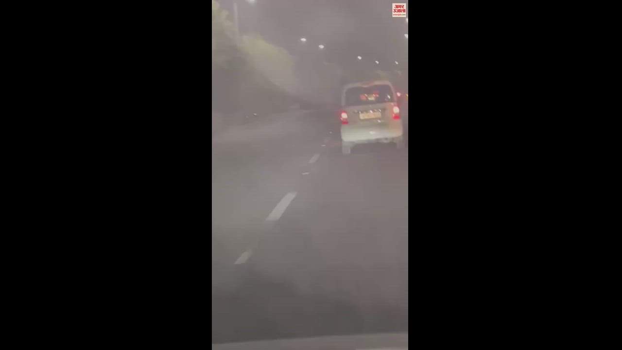 VIDEO : नोएडा में चलती कार से बाहर निकल स्टंट कर रहा था युवक, पुलिस ने काटा 13 हजार का चालान