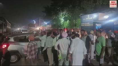 VIDEO : People troubled by ash coming out of chemical factory sit on dharna