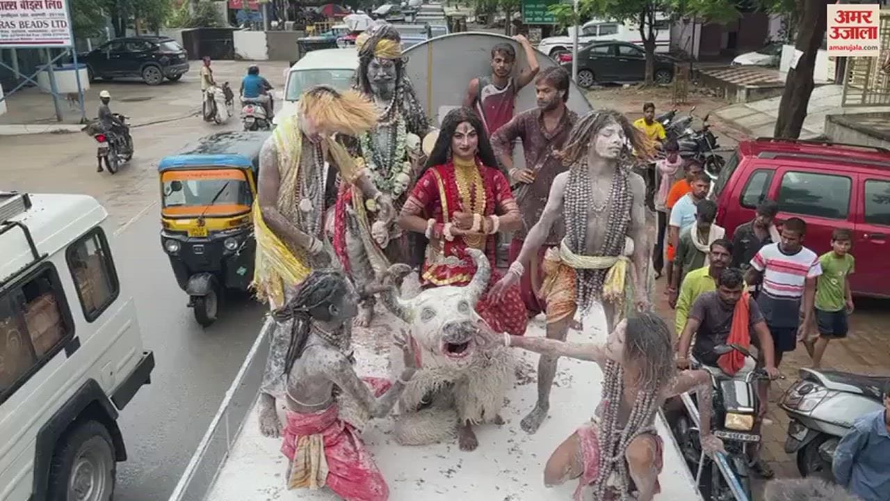 VIDEO : rush of Kanwadis in Kashi city sky echoing with chanting of Har Har Mahadev