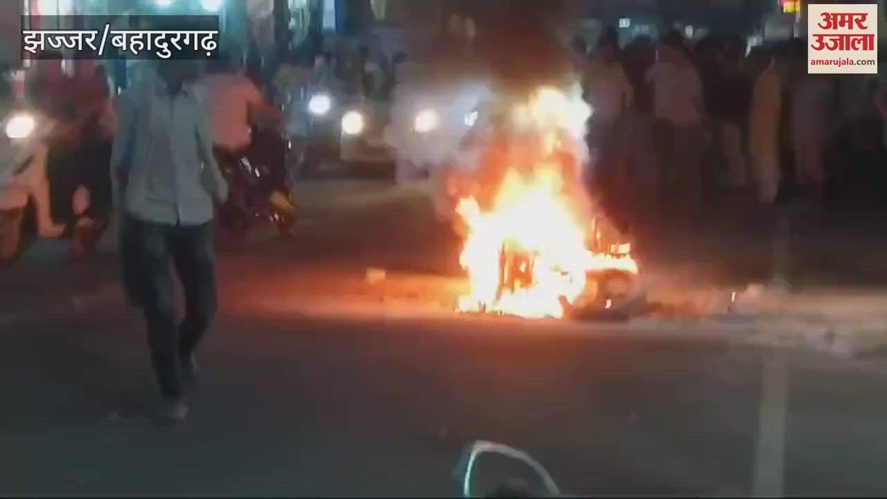 VIDEO : Bike caught fire near Ambedkar Chowk in Jhajjar