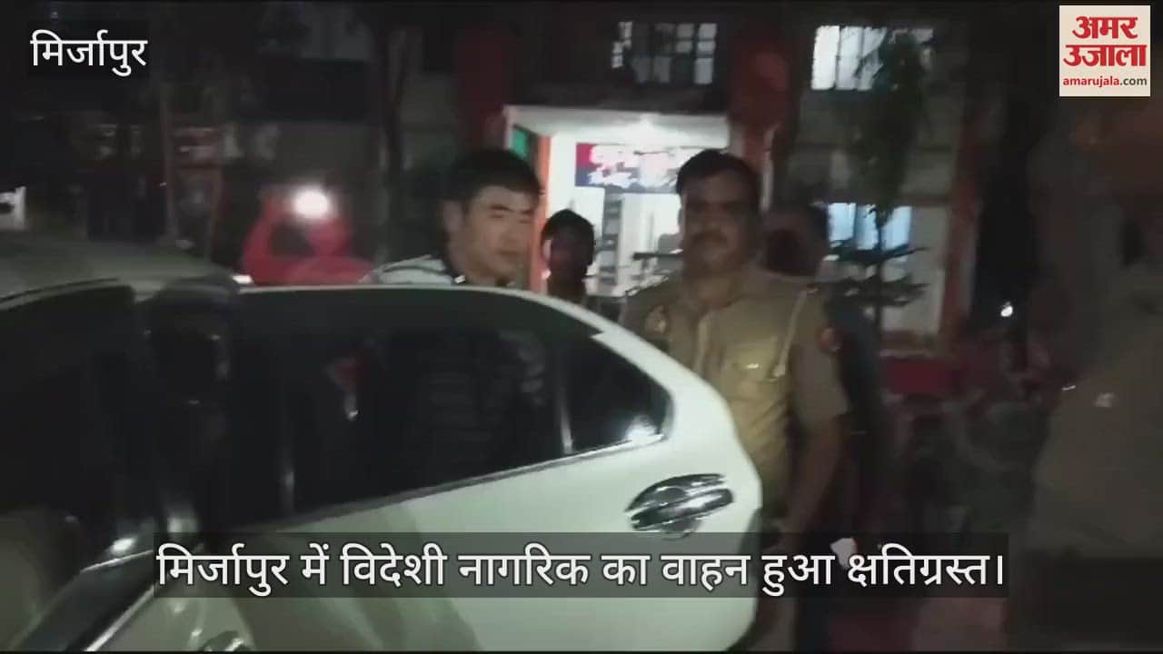 VIDEO : A foreign national had a narrow escape in Mirzapur a Japanese youth vehicle was damaged police took him to the airport