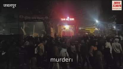 A young man was murdered in front of his wife and children