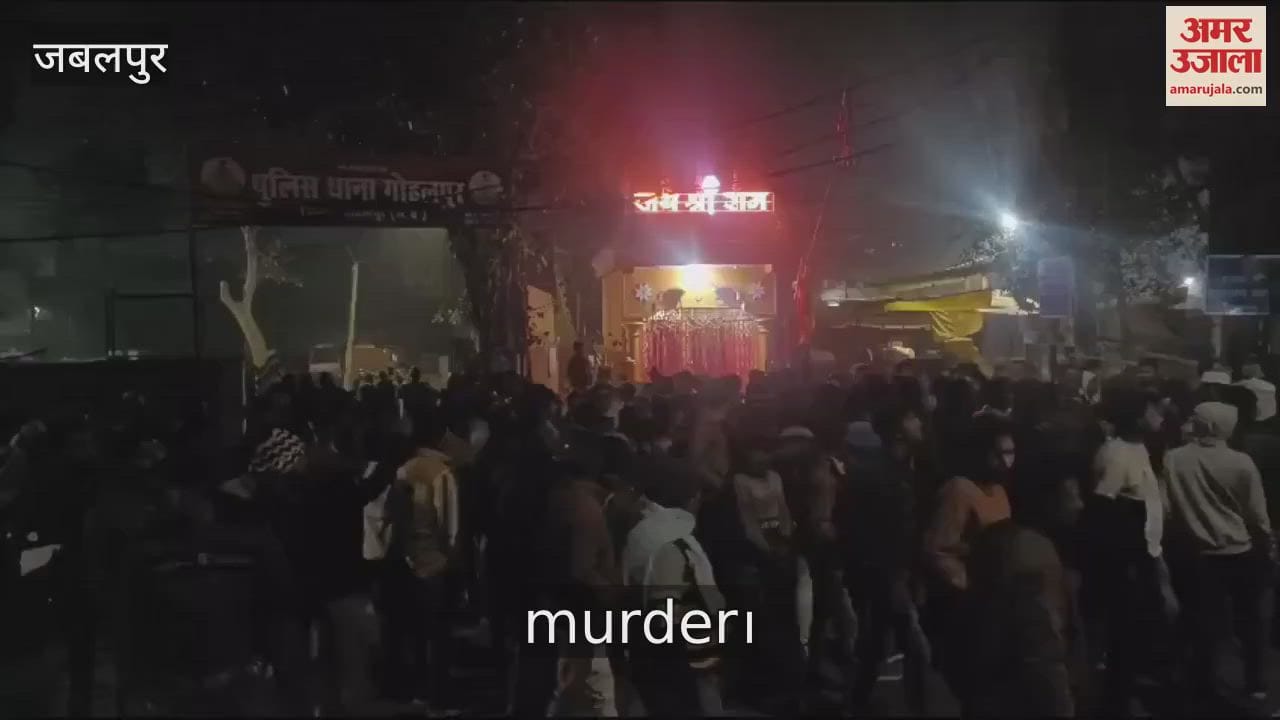 A young man was murdered in front of his wife and children