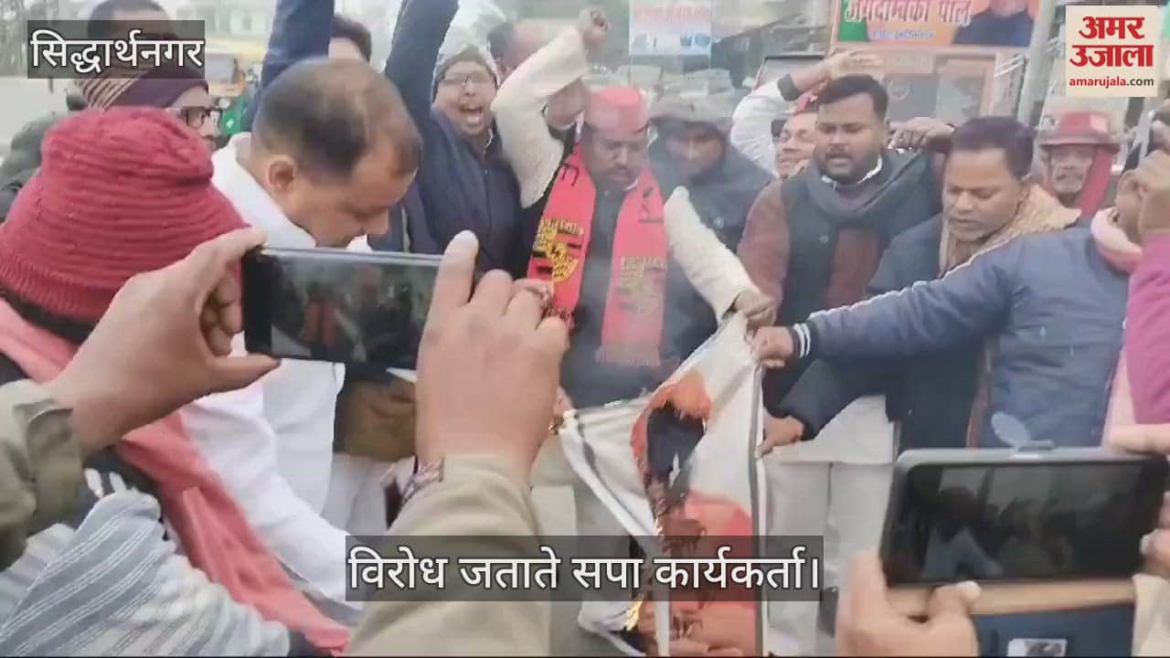 VIDEO : Grandson blackens the photo of Mahant Raju Das