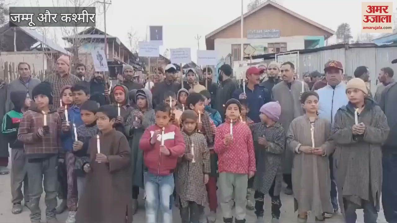 VIDEO : Candle march in honor of martyred soldier in Rafiabad, Sopore, appeal for unity and peace