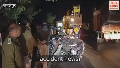 Car collides with parked truck, two dead