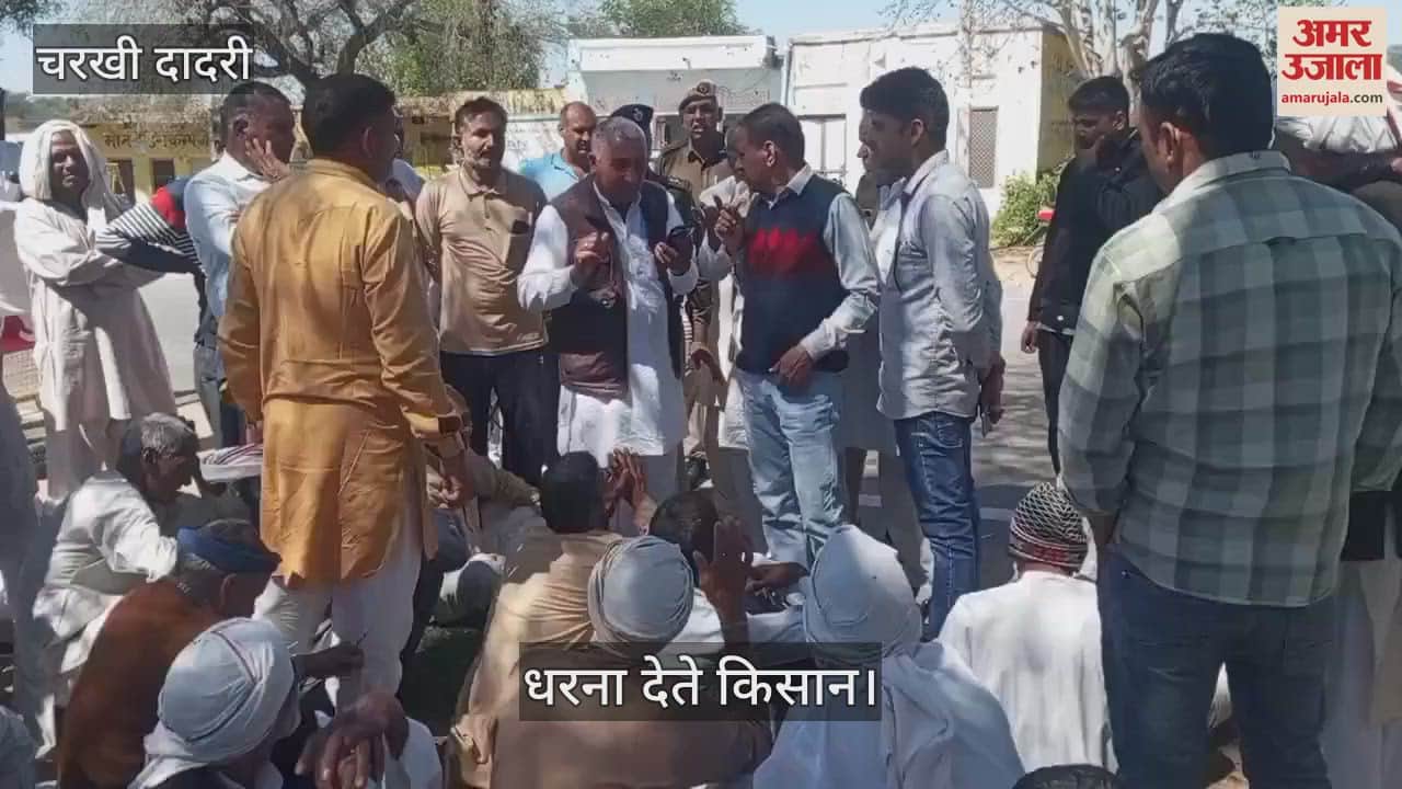 VIDEO : Farmers of Laad village sat on dharna after driving tractors over crops destroyed by hailstorm in Dadri