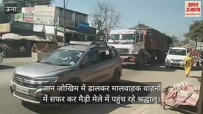 VIDEO : Devotees are reaching Maidi fair by risking their lives by traveling in cargo vehicles