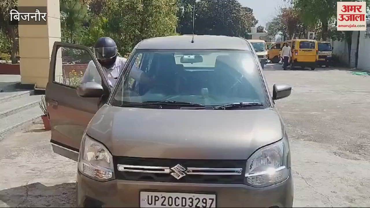 VIDEO : Bijnor: Police imposed a fine of Rs 1,000 for driving a car without a helmet.