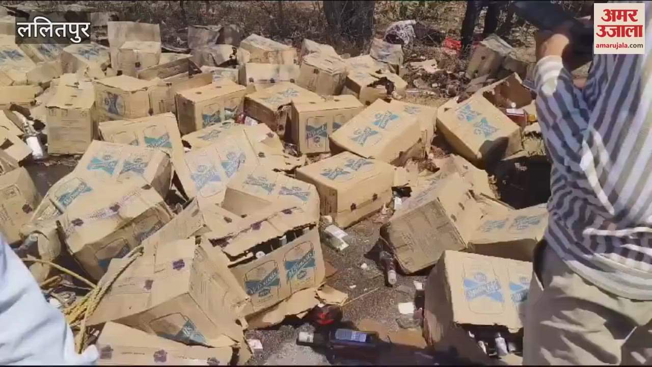 VIDEO : Truck loaded with liquor crates overturned in Lalitpur