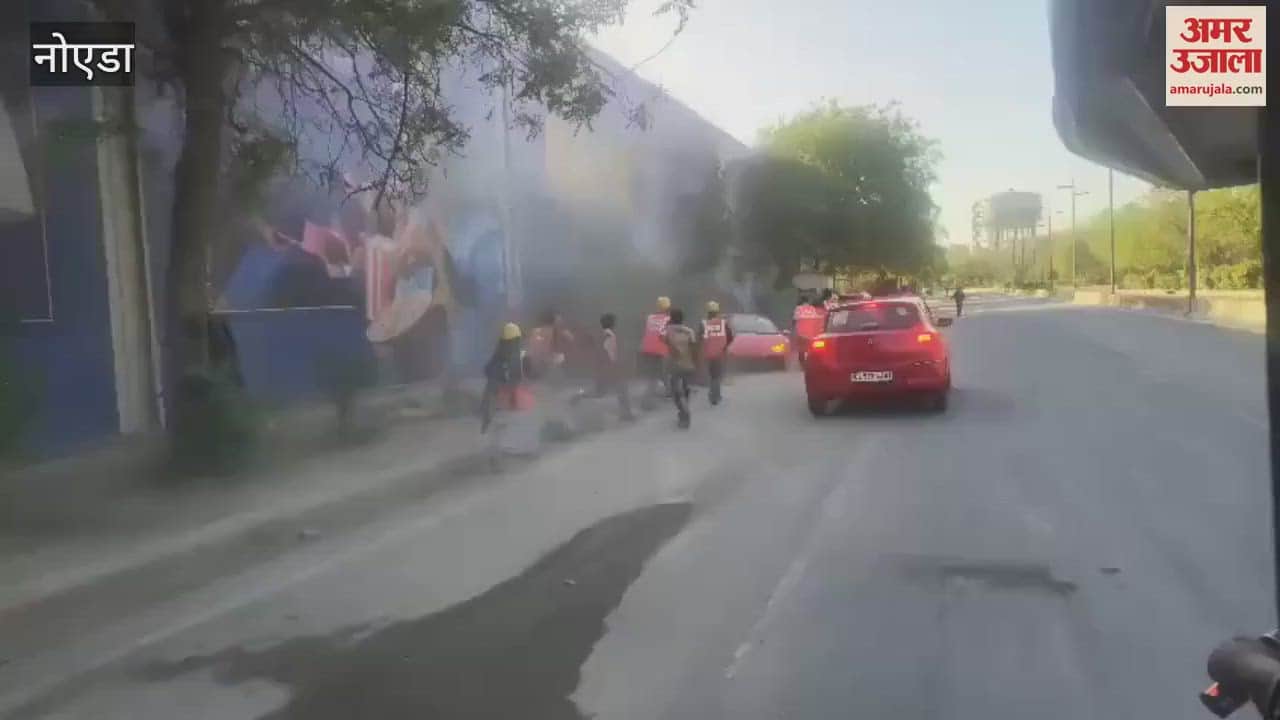 VIDEO : A speeding Lamborghini car hits workers sitting on the footpath in Noida
