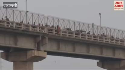 VIDEO : woman climbed on Samneghat bridge after persuasion police brought her down troubled dispute the family