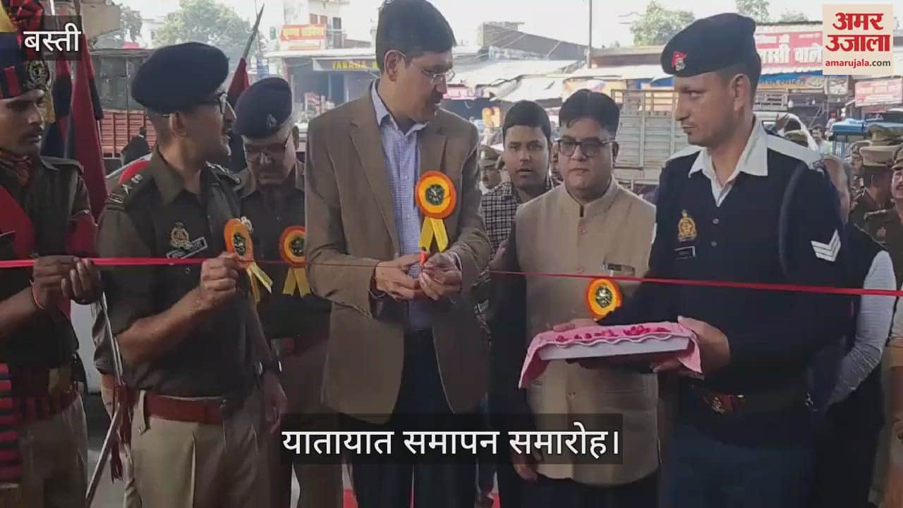 VIDEO : End of traffic safety month, helmets distributed