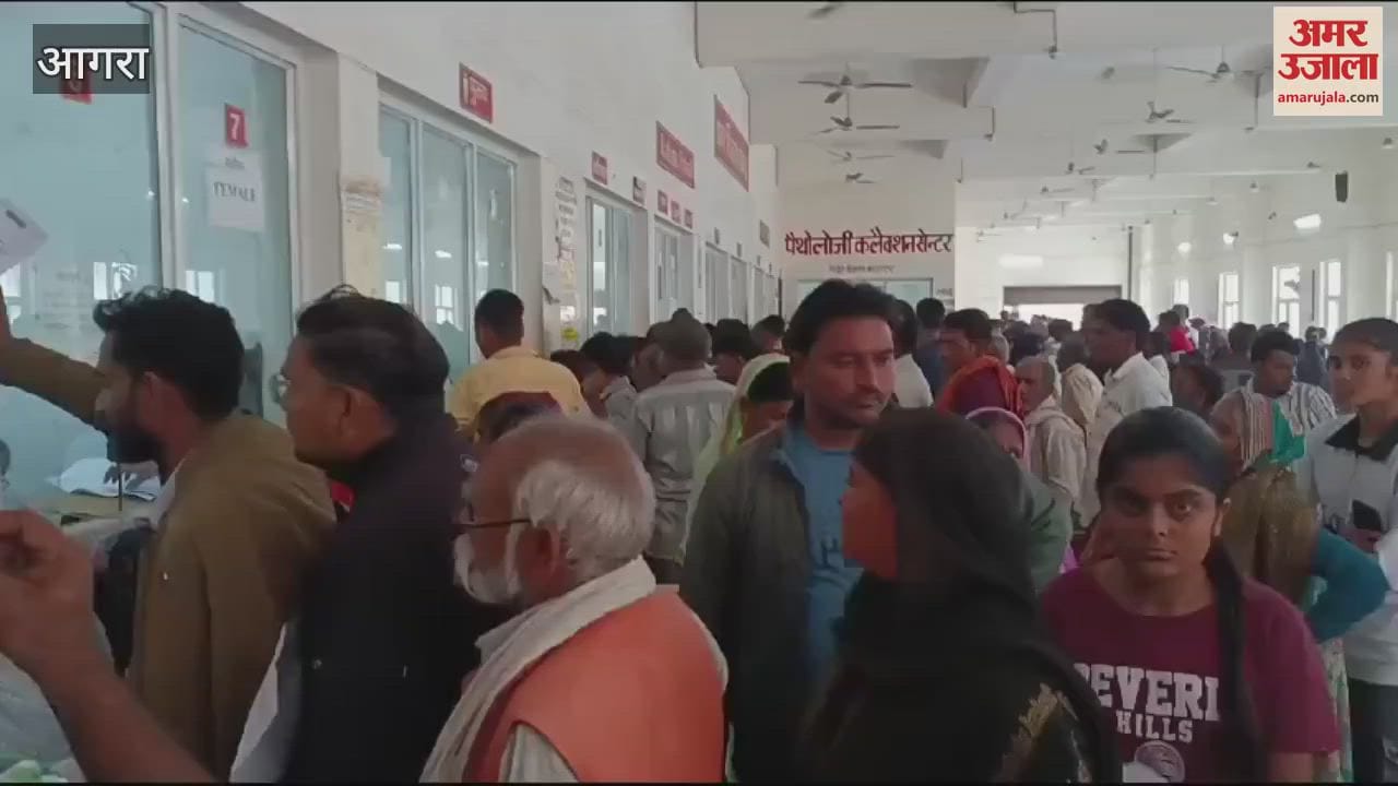 VIDEO : एसएन मेडिकल कॉलेज में मरीजों की लंबी कतार, पर्चे बनवाने के लिए हुई मारामारी