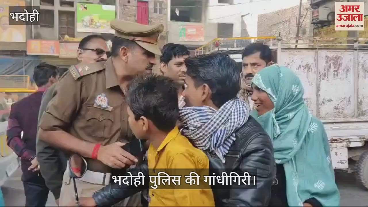 VIDEO : Gandhigiri of police in Bhadohi garlands were put on those who did not wear helmets traffic in-charge appealed to follow traffic rules