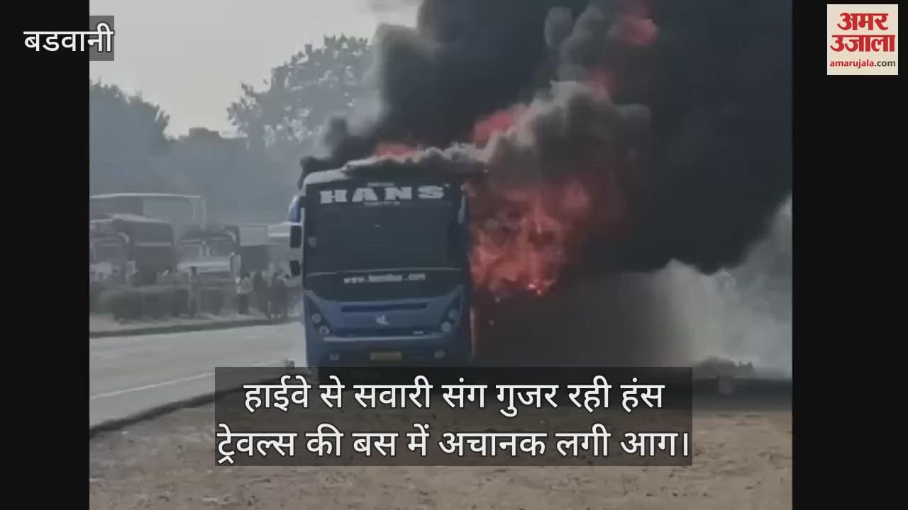 A sleeper coach bus of Hans Travels carrying 40 passengers caught fire while passing through the highway
