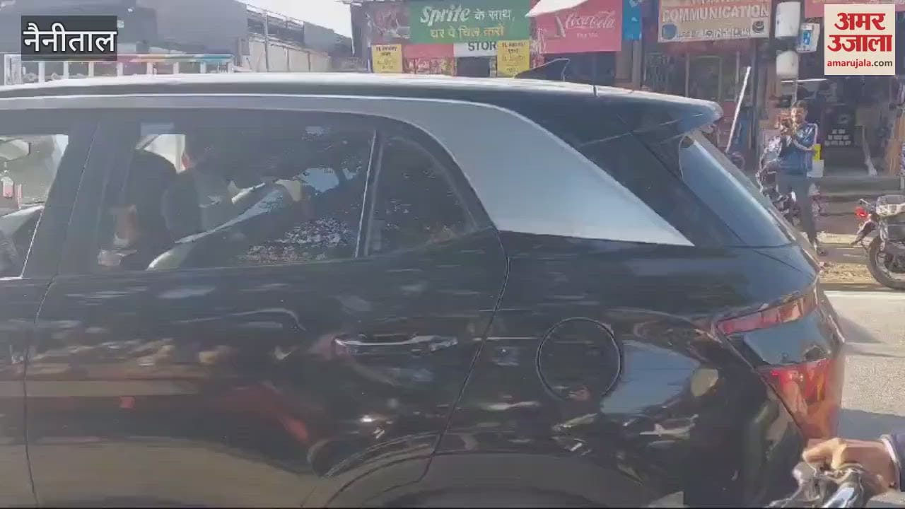 VIDEO : युवक ने शराब पीकर मचाया उत्पात, बीच सड़क पर सो गया...लग गया जाम; लोग परेशान