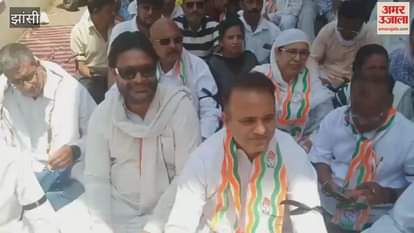 Congress workers staged a sit in protest in Jhansi over ED s action