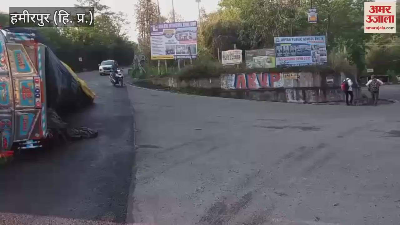 Hamirpur A truck loaded with cement overturned on the road in Bhota on NH 103 after going out of control