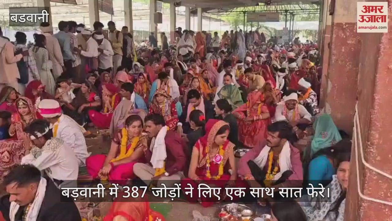 387 couples took seven vows together in a mass marriage ceremony in Barwani