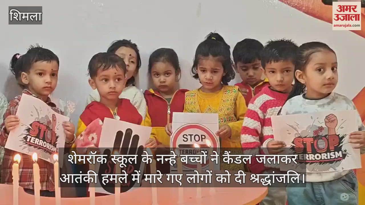 The little children of Shamrock School paid tribute to those killed in the terrorist attack by lighting candles