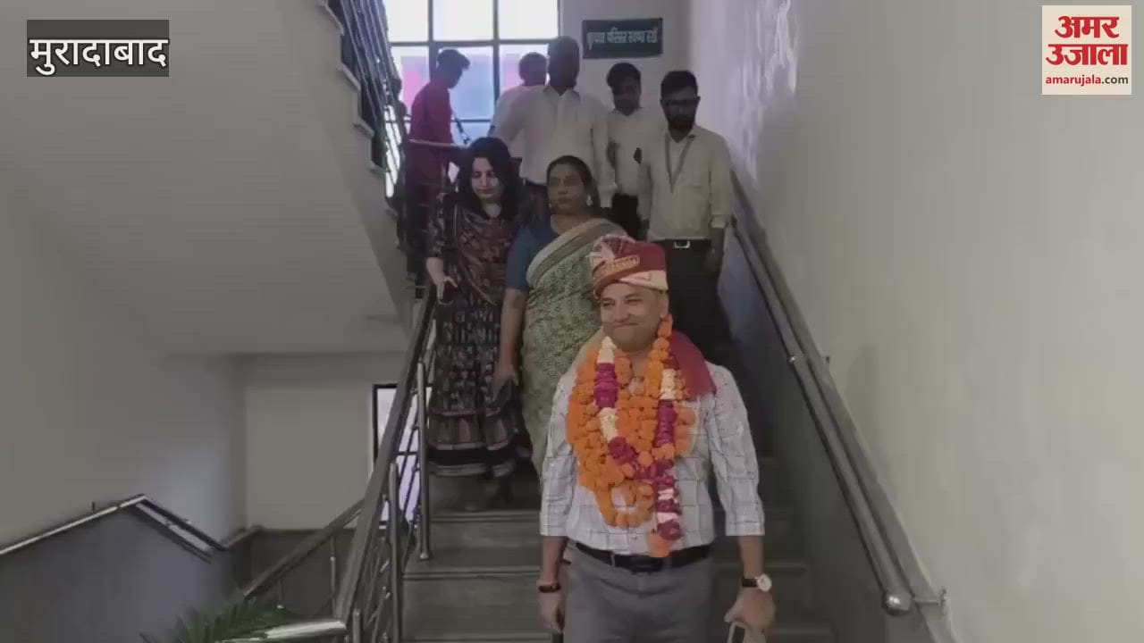 Farewell given with band music, employees seated on a buggy bid farewell to MDM vice president