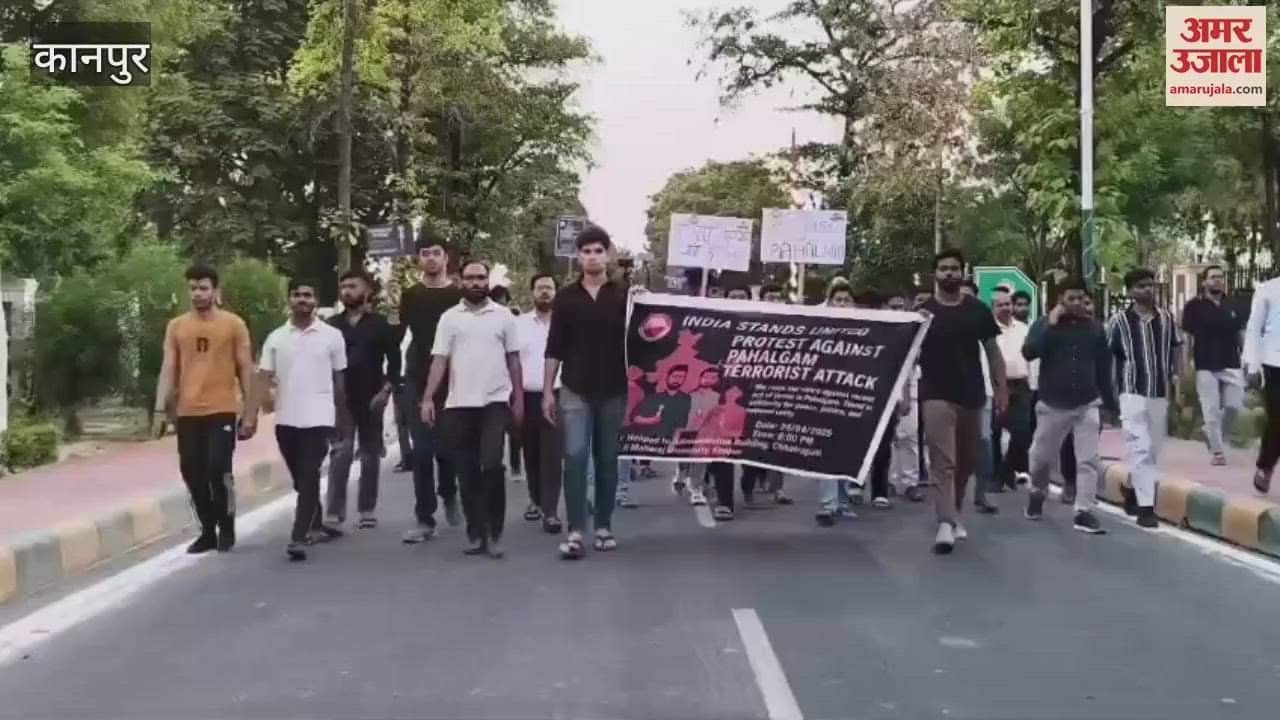 Students took out a candle march in CSJM University in protest against the terrorist attack