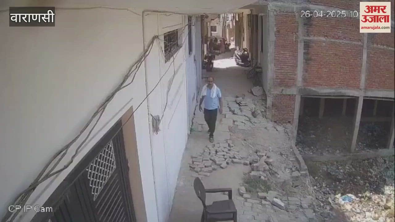 young man fell into 15 feet deep pit along with bike in Varanasi