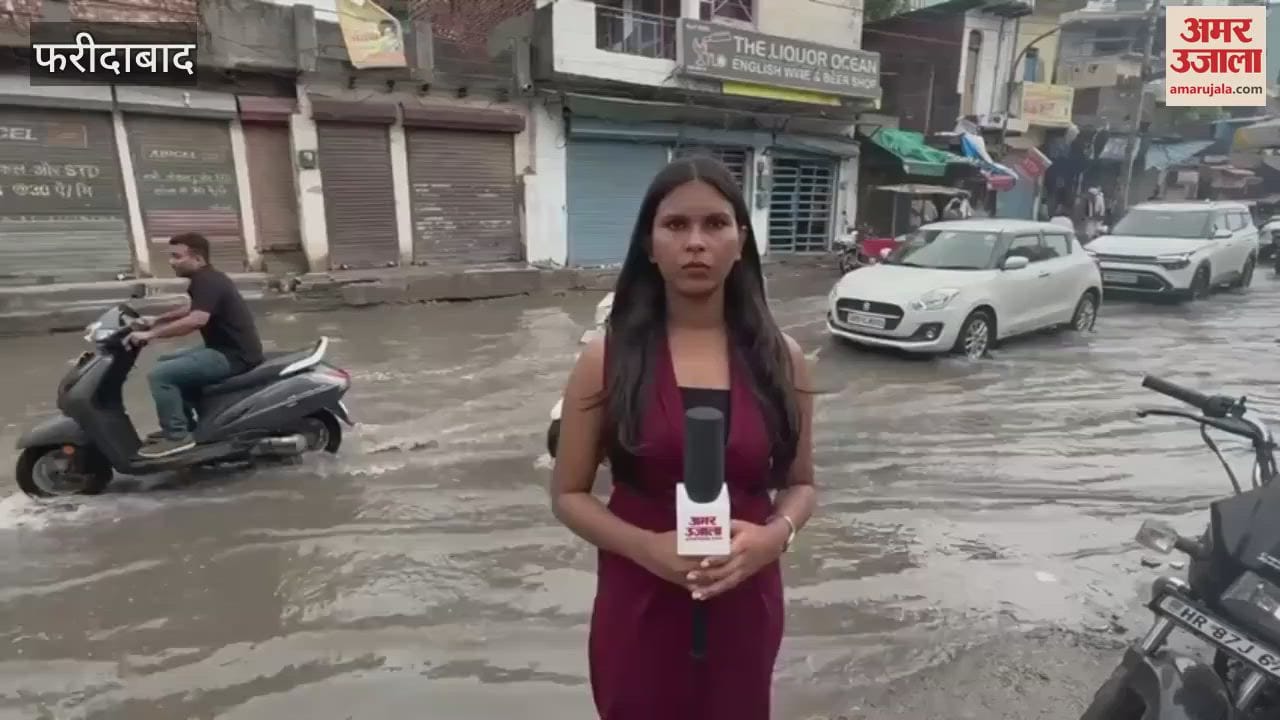 Water filled on the main road outside Faridabad railway station