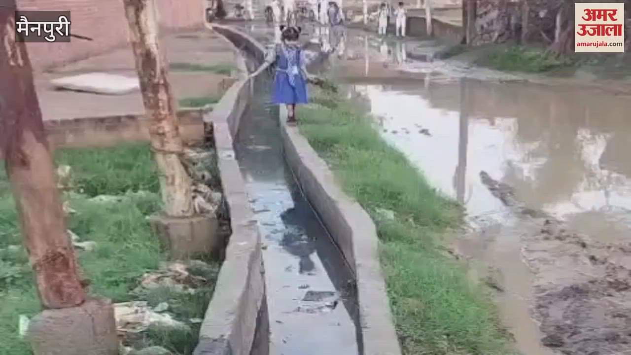 innocent child was going to school by walking on the wall of the drain