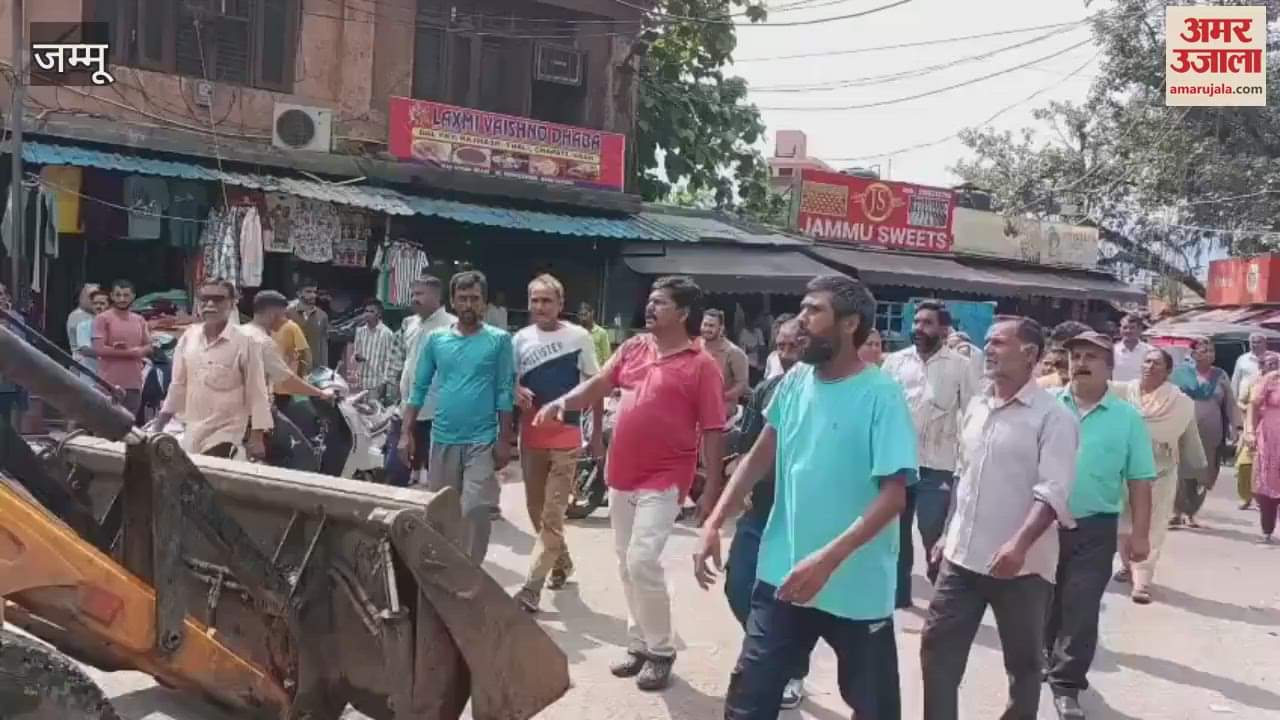 Cleaning workers climbed on the JCB that had come to remove garbage, staged a sit-in protest in the city council office