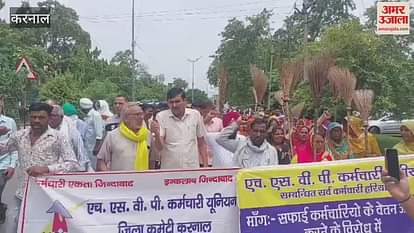 HSVP sanitation workers in Karnal protest by holding brooms upside down, salary pending for three months