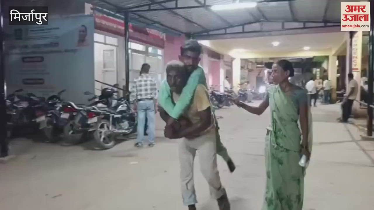 father is carrying his son on his shoulders for X-ray in hospital