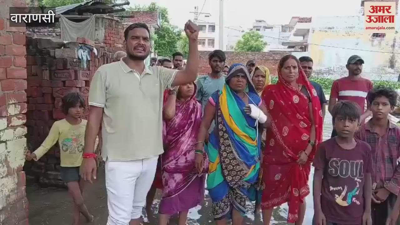 Villagers protested by standing in dirty water women said snakes are entering house