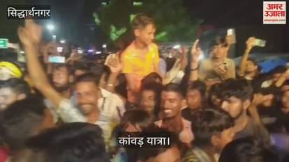 People danced during the Kanwar Yatra