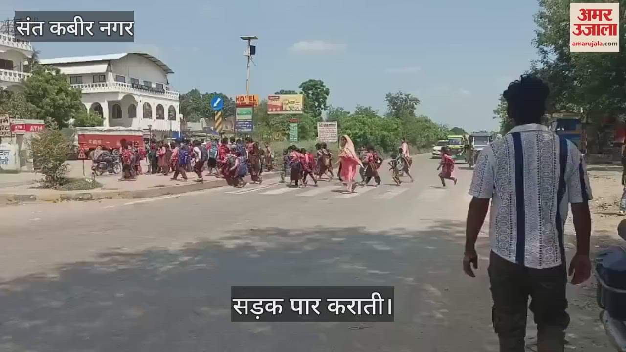 Teachers of Digha school help children cross the highway everyday