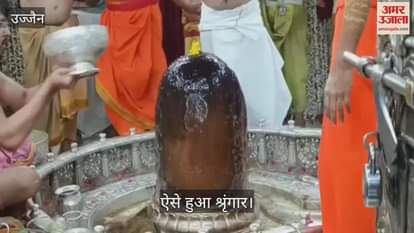 Baba Mahakal decorated with cannabis and moon on his forehead during Bhasma Aarti