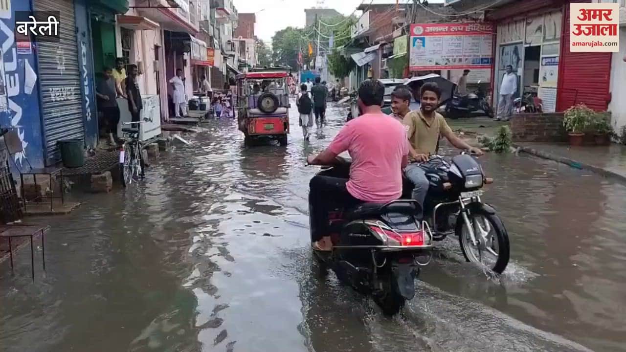 People struggling with waterlogging on the roads due to heavy rain in Bareilly