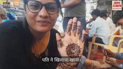 Teej special...Mehndi on both hands, caring husband feeding her