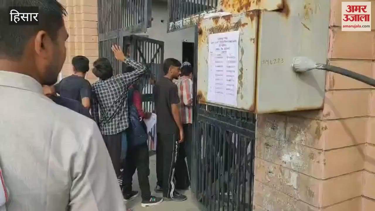 Long queues of candidates outside CET exam centre at Jat School in Hisar, tight security arrangements