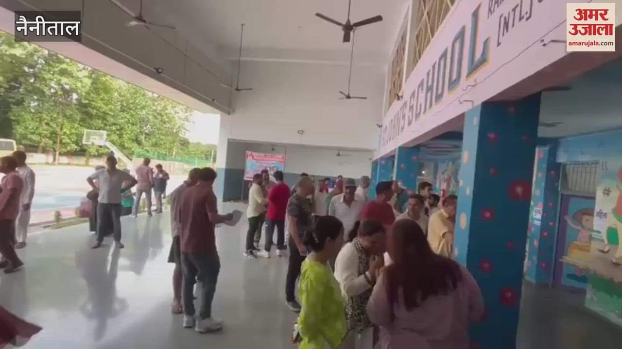 Crowd of voters gathered at polling station in Ramnagar