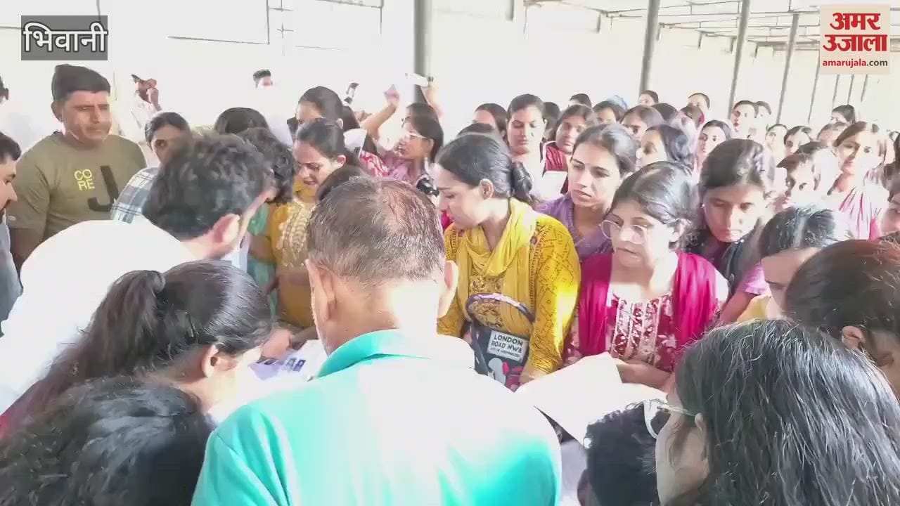 Biometric system stopped working during rain in HTET exam in Bhiwani, candidates were standing in queue for one and half hour